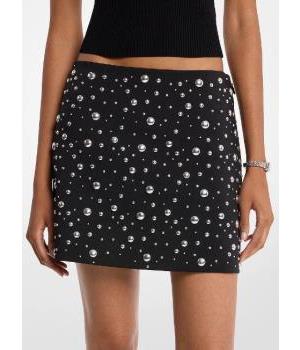 Minifalda Michael Kors de crepé elástico con tachuelas