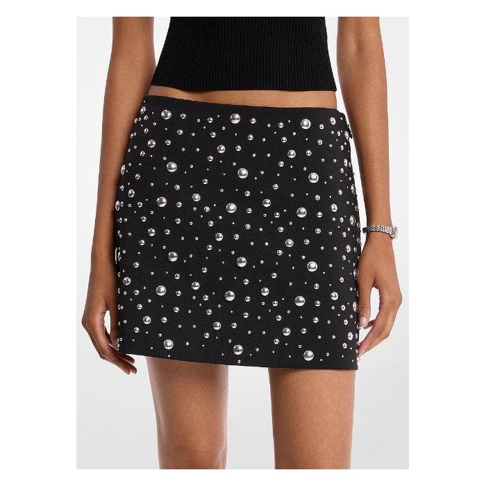 Minifalda Michael Kors de crepé elástico con tachuelas